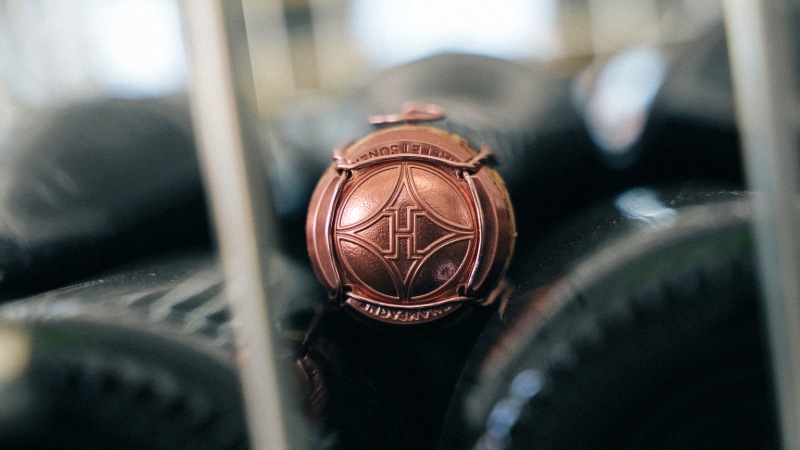 Korken p� en champagneflaske